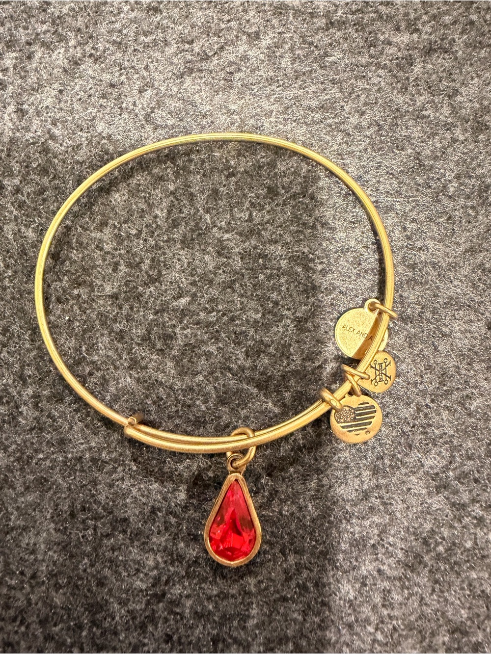 Alex and Ani Gold Bangle with Red Teardrop Charm